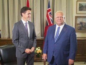 Prime Minister Justin Trudeau meets with Ontario Premier Doug Ford at the Queen's Park legislature in Toronto on Tuesday, Aug. 30, 2022.