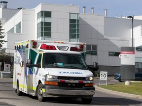 An ambulance is seen leaving Rockyview General Hospital on Tuesday, September 28, 2021.