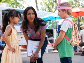 Jenny (Jessalyn Wanlim) talks to Zoe (Elle/Sasha Bernardo) and Charlie (Mason/Nolan Gahan) at the Fun Fair. Photo by Jackie Brown for Wolf + Rabbit Entertainment