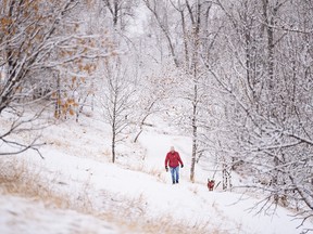 The pathway in Crescent Heights was covered in fresh snow after an overnight snowfall on Sunday, January 22, 2023.