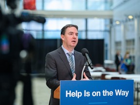 Health Minister Jason Copping speaks at a press conference at Foothills Medical Center on January 26.