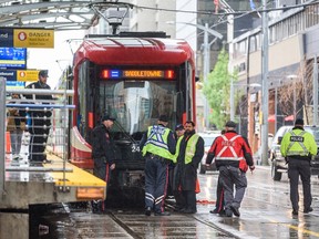 Calgary police and transit peace officers investigate an incident at the 8th Street CTrain station, where a female was pushed in front of a train but was able to escape uninjured on June 14, 2022. Kelly W. Sundberg, a Mount Royal University criminologist, says a national task force on transit safety should be created, as suggested by a national transit workers union.