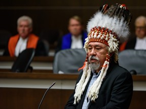 Piikani First Nation Chief Stanley Grier speaks at the three Alberta Courts eagle feather ceremony held at Ceremonial Courtroom, which marked the introduction of sacred eagle feather in Alberta courthouses on Friday, November 8, 2019.  It allowed witnesses to swear oaths upon the eagle feather, which is a sign of respect for Indigenous culture.