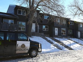 Calgary police hold the scene at the 6900 block of Ranchero Road N.W. in Calgary on Sunday, January 1, 2023.