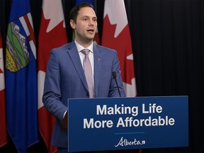 Minister of Affordability and Utilities Matt Jones provides an update on $600 support payments coming to some families and seniors, during a press conference at the Alberta Legislature in Edmonton, Monday Jan. 9, 2023.