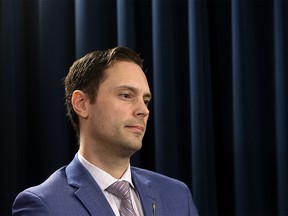 Minister of Affordability and Utilities Matt Jones provides an update on $600 support payments coming to some families and seniors, during a press conference at the Alberta Legislature in Edmonton, Monday Jan. 9, 2023.