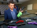 Acting Staff Sgt. Ben Lawson with the Firearms Investigative Unit displays some of the 3D guns police have seized in Calgary on Thursday, January 19, 2023.