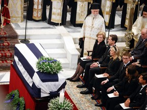 Greece's former Queen Anne Marie (Front row L), former Crown Prince Pavlos, Princess Marie-Chantal and guests sit next to the coffin during the funeral service of former King of Greece Constantine II in the Metropolitan Cathedral of Athens, on January 16, 2023.