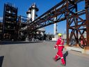 A Shell employee walks past the company's new Quest Carbon Capture and Storage facility in Fort Saskatchewan, Alberta in 2021.