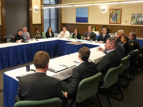 The task force is shown during a meeting on December 16.