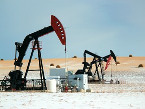 FILE PHOTO: Three operational pumpjacks adjacent to Sunset Ridge and Highway 22 battle through the winter chill on December 6, 2019. The horizontal wells, two operated by Ridgeback Resources and one by ORLEN Upstream, are producing oil from the Cardium formation.