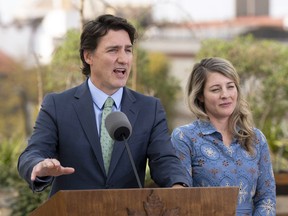 Foreign Affairs Minister Melanie Joly listens as Prime Minister Justin Trudeau speaks during a news conference, Wednesday in Mexico City, Mexico, January 11, 2023.