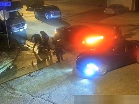 This still image from a Memphis street camera video released by the City of Memphis on January 27, 2023 shows police officers beating Tire Nichols in Memphis, Tennessee.