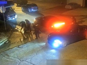 This still image from a Memphis street-cam video released by the City of Memphis on January 27, 2023, shows Police officers beating Tyre Nichols, in Memphis, Tennessee.
