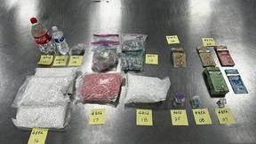 The police seized drugs and money.