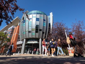 Students walk on the SAIT campus on Monday, October 3, 2022.