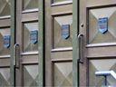 The brass doors installed outside the Calgary Courts Centre.