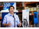 Prime Minister Justin Trudeau speaks during a news conference at a production facility of electric vehicle charger manufacturer Flo in Shawinigan, Quebec, Canada, January 18, 2023.  