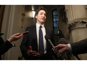 Prime Minister Justin Trudeau talks to reporters before he attends a caucus meeting on Parliament Hill in Ottawa, Ontario, Canada, January 27, 2023.