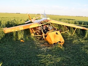 Pictured is the wreckage of crashed Zlin Savage Cub advanced ultralight that crashed near Didsbury on July 13, 2022, killing two men.