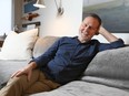 Jim Button relaxes in his southwest Calgary home on Friday, October 4, 2019. He and his family, along with others, raised millions for North America's first chair in Pediatric Psychosocial Oncology and Survivorship. Jim Wells/Postmedia