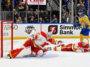 Calgary Flames goaltender Jacob Markstrom gives up the game-winning goal to St. Louis Blues centre Robert Thomas (not pictured) in overtime at Enterprise Center in St. Louis on Tuesday, Jan. 10, 2023.