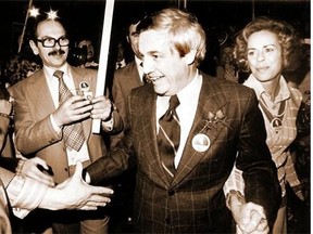 Premier Peter Lougheed and his wife Jeanne celebrate the Progressive Conservative party’s first re-election on March 26, 1975.