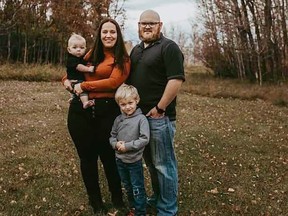 Carstairs resident Brad Dowell, 36, shown here with unidentified family members, died in a multi-vehicle crash on Highway 2 on the evening of Tuesday, December 27, 2022.