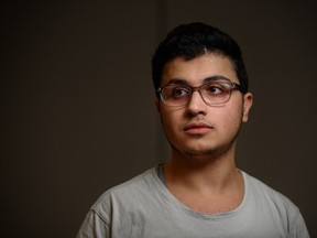 Syrian newcomer Mohamad Riad Abdul Kader, who lost 10 family members in the earthquake that shook parts of Syria and Turkey, takes a moment from his English class at Center for Newcomers to pose for a photo on Monday, Feb. 6, 2023 .