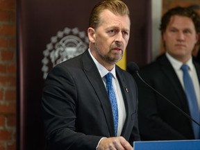 Public Safety and Emergency Services Minister Mike Ellis speaks during a media event announcing the collaboration between CPS and Alberta sheriffs for a safety improvement program at the Calgary Police Services East Village Safety Hub on Tuesday, February 14, 2023.