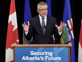 President of the Treasury Board and Minister of Finance Travis Toews discusses the Alberta 2023 budget during a press conference in Edmonton on Tuesday, February 28, 2023.