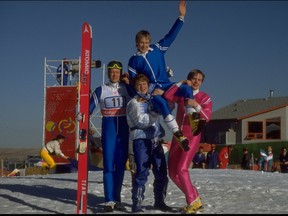 The 90-meter ski jumping team from Finland celebrated after winning the gold medal at the 1988 Calgary Winter Olympics.  Pictured are Matti Nykanen, Ari-Pekka Nikkola, Jari Puikkonen and Tuomo Ylipulli.Gray Mortimore /Getty Images