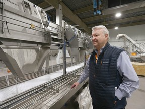 Rich Vesta, CEO of Harmony Beef poses in front of am automated trim sortation system (yet to be put into production) at the Harmony Beef plant near Balzac, north of Calgary on Tuesday, February 7, 2023. The Alberta government has announced a new agri-processing tax credit that, according to the government, will help attract large scale investment, diversify the economy and create jobs.
