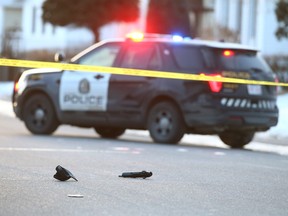 Calgary Police hold the scene at a shooting on 5 Avenue S.E. near 52 Street in the community of Penbrooke Meadows in Calgary on Wednesday, February 15, 2023.