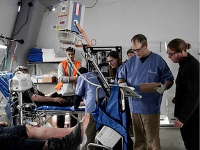 Doctors and nurses tend to injured patients at the 52-bed field hospital set up last week by Samaritan's Purse in Antakya, Turkey.