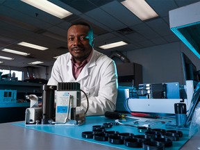 Calgary scientist Charles Odame-Ankrah recently obtained a U.S. patent for a photolytic converter which detects and breaks down nitrogen dioxide in the air. Odame-Ankrah says he hopes the achievement can help inspire other Black and immigrant youth to enter the sciences. He was photographed in his lab at Global Analyzer Systems on Monday, February 13, 2023.