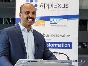 Sam Mathew, founder and CEO of Applexus Technologies, speaks to the media following the announcement that his company has chosen Calgary as its new Canadian headquarters on Wednesday, February 15, 2023.