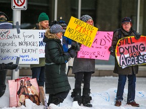 Protesters rally outside the Hyatt Regency Hotel where the sixth annual Recovery Capital Conference was taking place on Tuesday, February 21, 2023. Protesters were calling for changes to addictions recovery programs in the province.