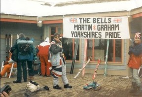 Dominic Sore (left) and Chris Sore (right) display one of the banners they created to cheer on athletes at the 1988 Winter Olympics.  Photo courtesy Dominic Sore.