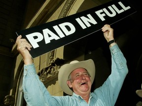 The then prime minister Ralph Klein announced that the province's debt had been paid off in 2004.