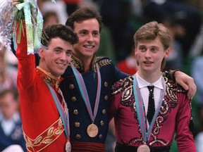 CALGARY, CANADA:  U.S. figure skater Brian Boitano (C), Canadian Brian Orser (L) and Ukrainian Viktor Petrenko smile on the podium following the men's competition 20 February 1988 in Calgary at the Winter Olympic Games. Boitano won the gold medal in front of Orser (silver) and Petrenko (bronze). AFP PHOTO/DANIEL JANIN