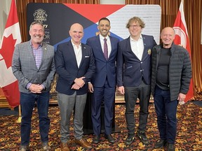 Shovel. Dan McLean, Randy Boissonnault, Minister of Tourism and Associate Minister of Finance, Calgary Skyview MP George Chahal, Coun. Gian-Carlo Carra and Coun. Andre Chabot on Friday at an announcement of 4.9 million in funding for new protected bike lanes and sidewalk upgrades in the Beltline. Brodie Thomas/Postmedia