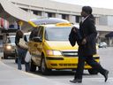 Passengers landing at Calgary International Airport will now be able to hail an Uber from one of three doors on the arrivals level. 