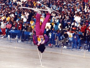 People came out by the thousands to take in the demonstration sport of freestyle skiing at the 1988 Calgary Winter Olympics. Here, France's Christine Rossi shows off a trick in the freestyle ballet event at Canada Olympic Park on Feb. 25, 1988. For her efforts, she won gold.  Postmedia archives.