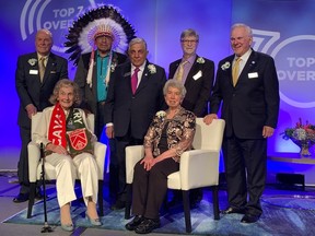 The 2021 Top 7 Over 70 winners: Front row, seated: Marg Southern and Bonnie Kaplan; Back row, left to right: Don Taylor, Miiksika'am (Elder Clarence Wolfleg), Sherali Saju, Louis B. Hobson and Murray McCann. Christina Ryan photo.