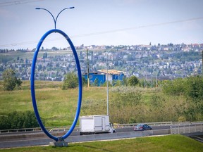 Travelling Light, also known as "The Giant Blue Ring" on 96 Avenue N.E. The installation was panned by the public, along with other art projects tied to highways, which eventually resulted in the suspension of the city program that saw one per cent of any major infrastructure project’s budget put towards public art.