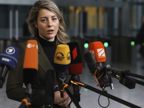 Canadian Foreign Minister Mélanie Joly speaks with the media as she arrives for a meeting of NATO foreign ministers at NATO headquarters in Brussels, on Thursday, April 7, 2022. Expanding the North Atlantic Treaty Organization has become a major focus of Parliament's foreign affairs committee as it tours several European countries to study the impact of the war in Ukraine, the committee chair said in an interview in Warsaw Sunday.
