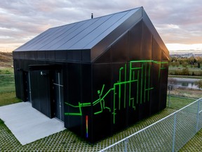 The Forest Lawn Lift Station sits with its public art light display in the setting sun in Calgary, Alta., on Sunday, Sept. 27, 2015.