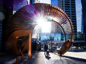 The afternoon sun shines through a sculpture outside TC Energy's headquarters in Calgary.