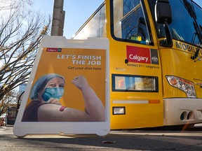 The City of Calgary's mobile COVID-19 vaccination bus, parked in front of city hall on Oct. 7, 2021.
